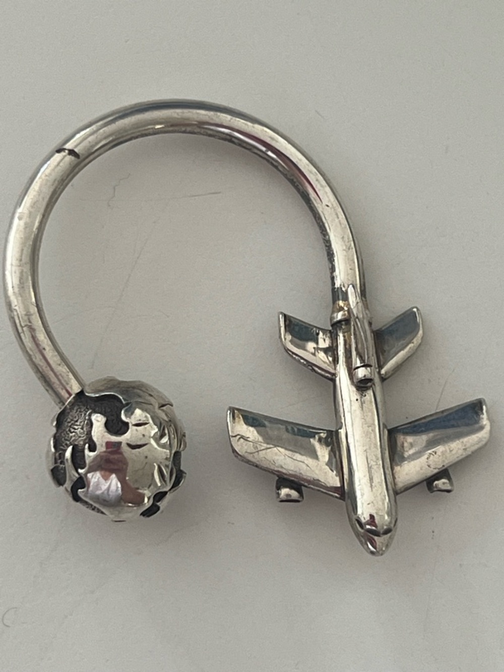Tiffany and Co Silver Airplane and Globe keychain. - Picture 2 of 5